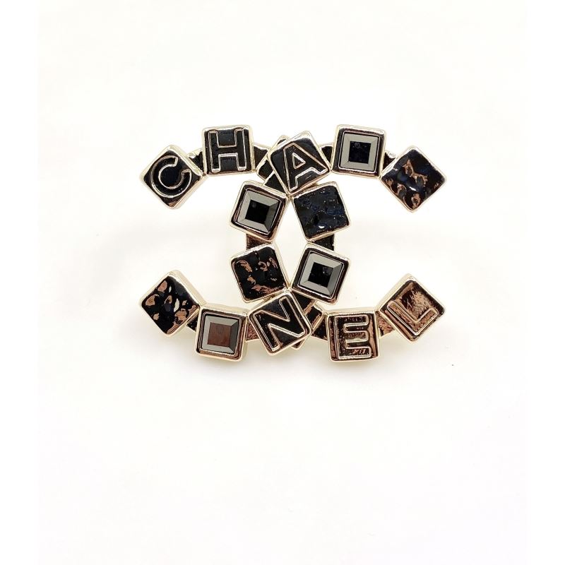 Ch*el brooches